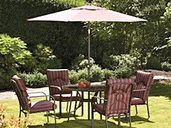 table and chairs with umbrella
